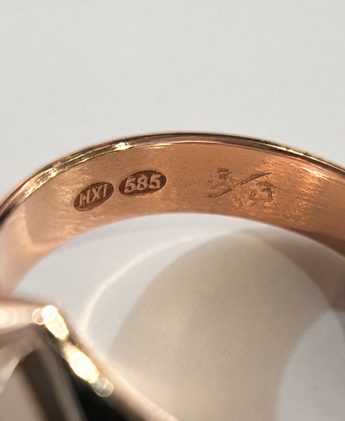 585 hallmark stamped inside the ring